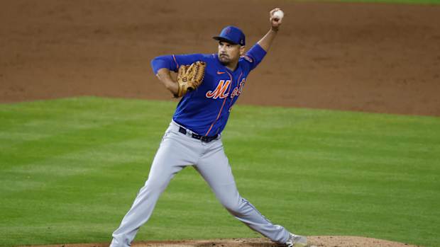Mets pitcher T.J. McFarland throws during spring training.